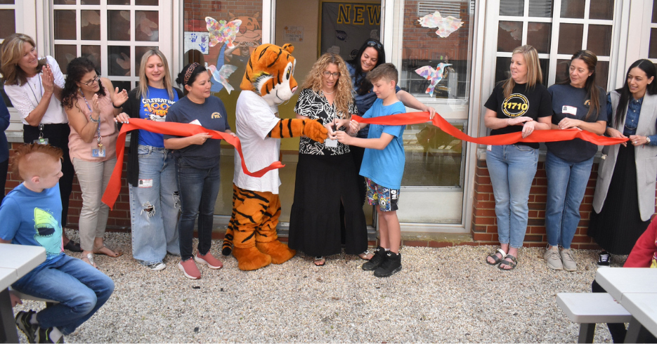 Newbridge Road Elementary School Principal Amanda Licci with students.